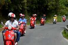 Riding the Vespas along the curvy roads of Italy