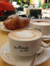 Croissant and cappuccino at 